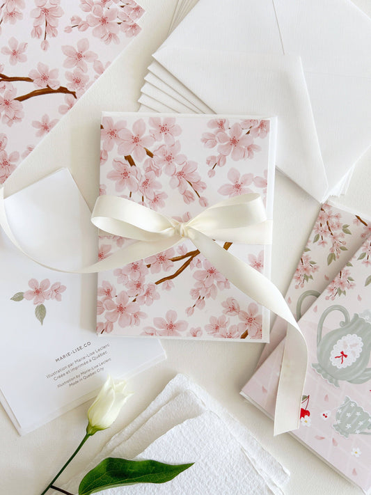 Tea under the cherry blossom tree greeting card