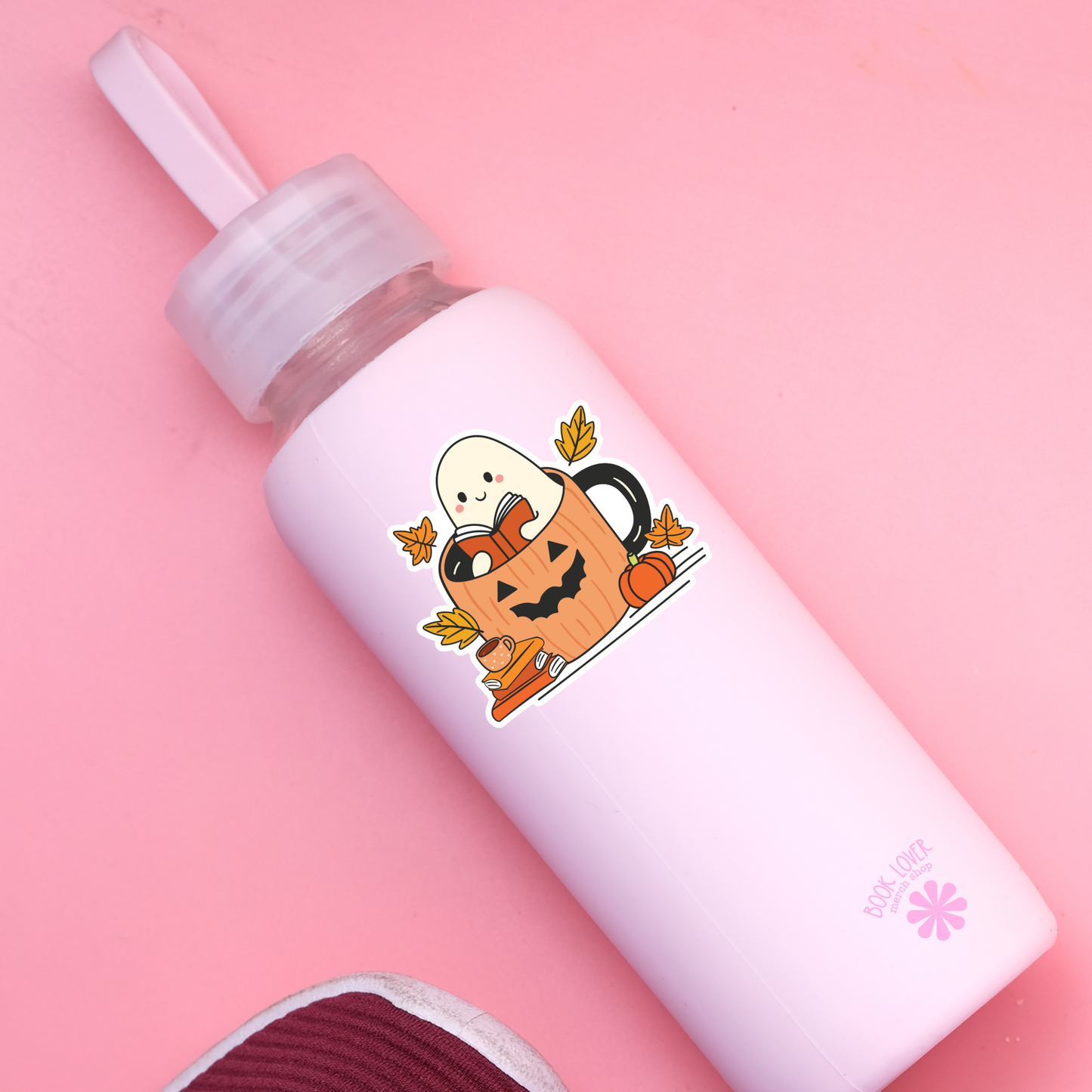 Ghost reading in a pumpkin mug sticker
