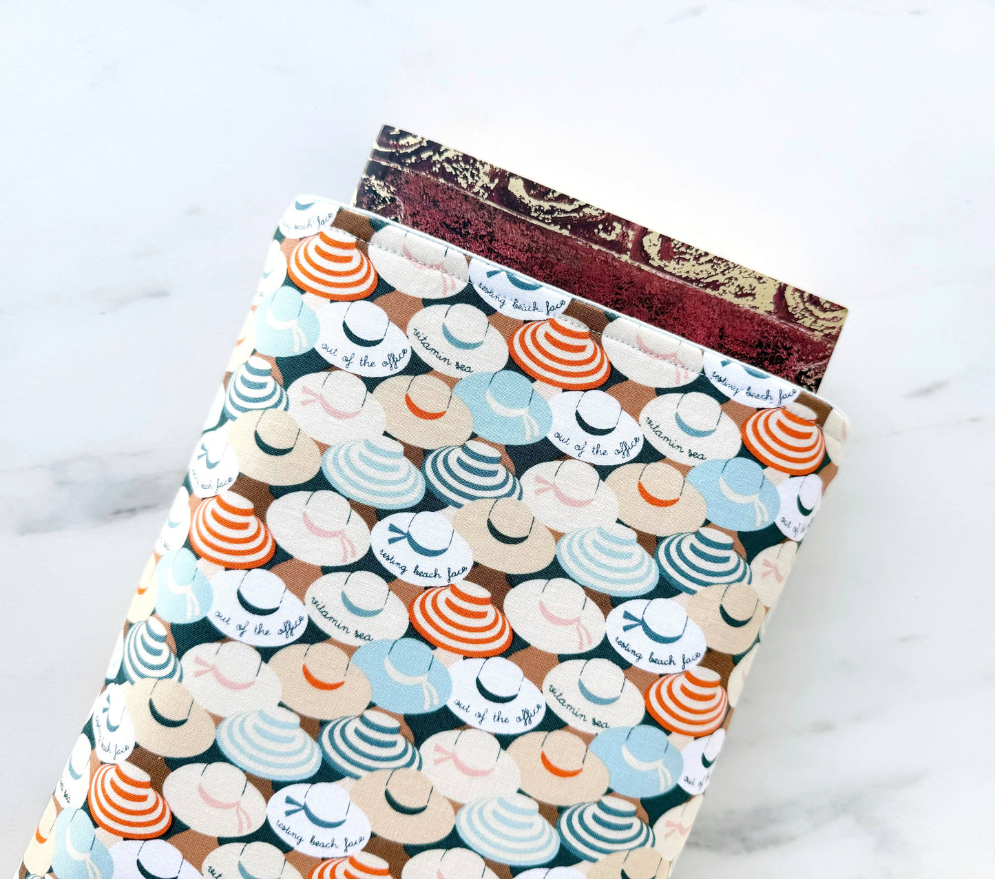 Sun hats padded book sleeve