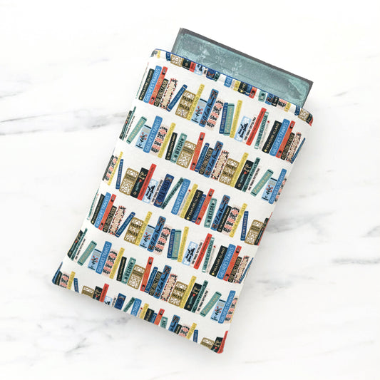 Library shelves (cream) padded book sleeve