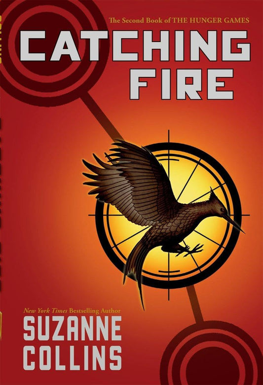 Cover of the book 'Catching Fire by Suzanne Collins'.