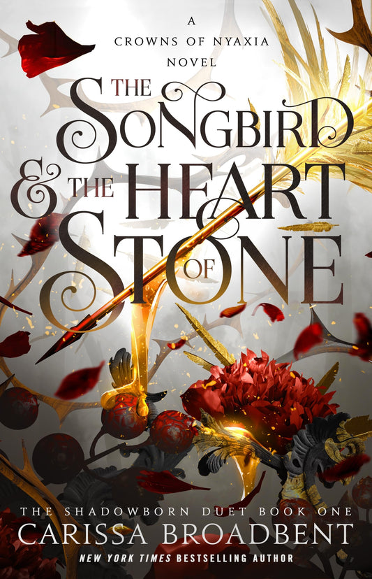 Cover of the book 'The Songbird and the Heart Stone by Carissa Broadbent'.