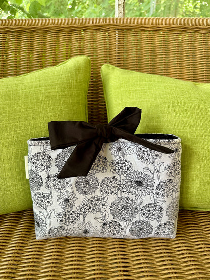 The cottage bow book sleeve SM