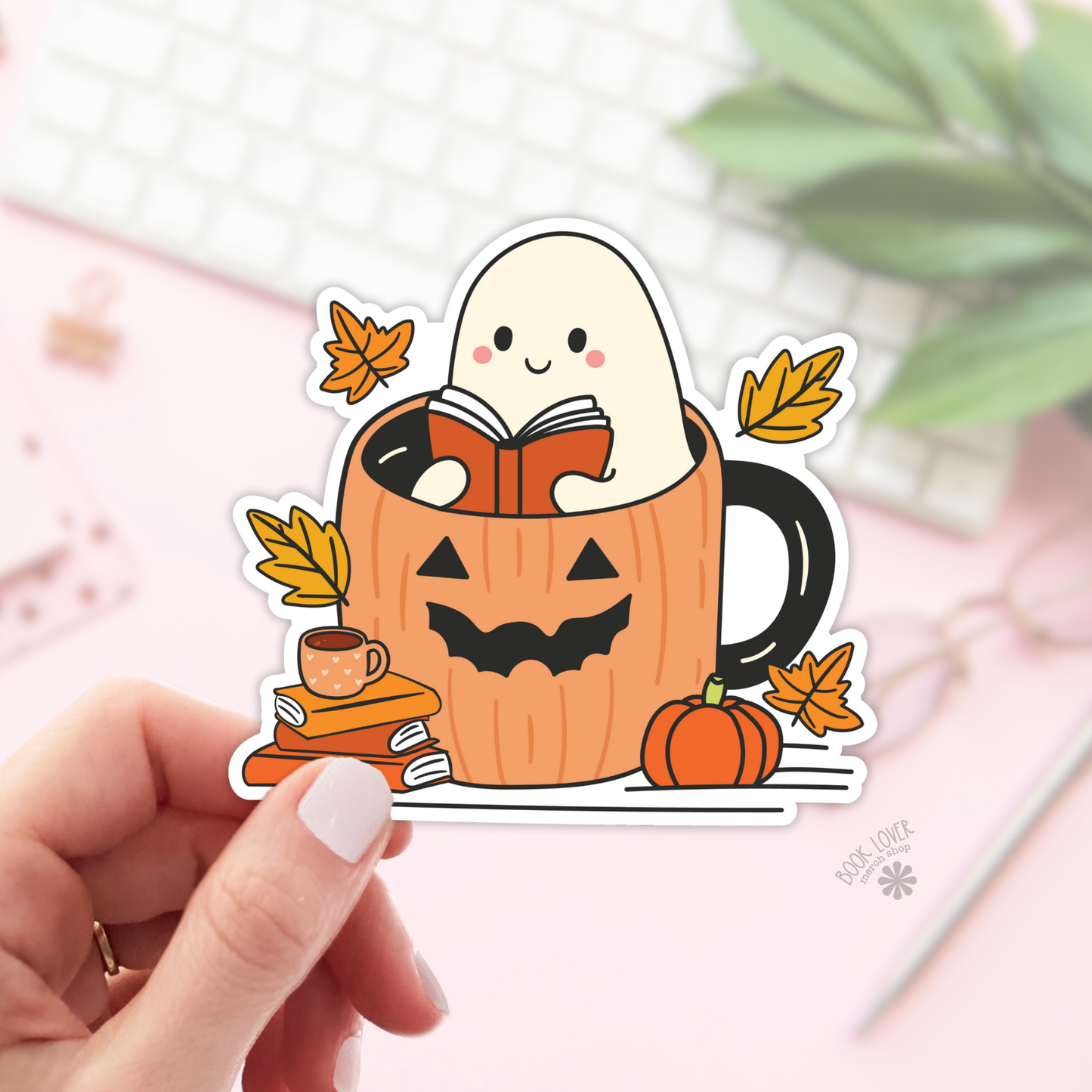 Ghost reading in a pumpkin mug sticker