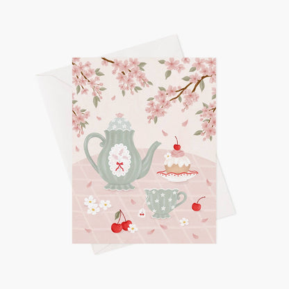 Tea under the cherry blossom tree greeting card