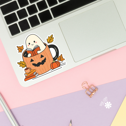 Ghost reading in a pumpkin mug sticker