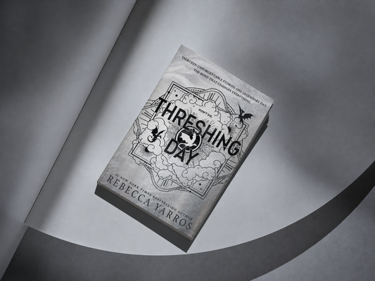 Threshing Day by Rebecca Yarros on a smoky silver and charcoal backdrop